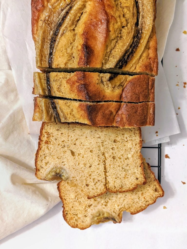 A quick and easy healthy banana bread made with whole wheat flour and protein powder to cut out some of the carbs and also add a protein boost. Even more protein with the Greek Yogurt!