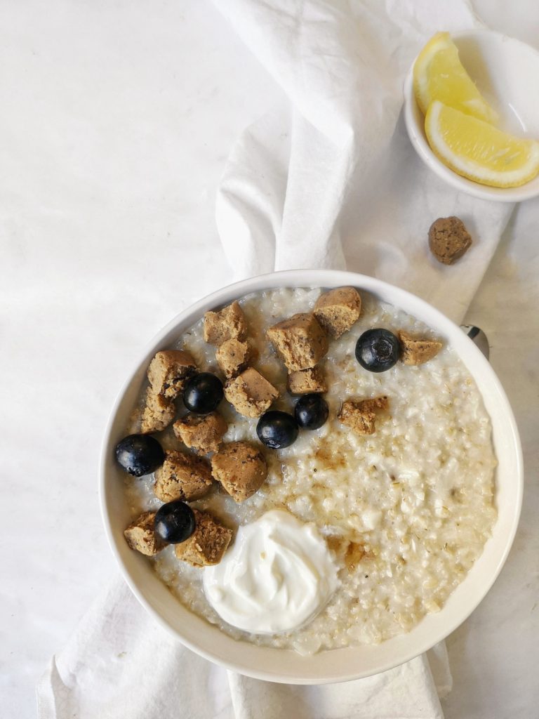 This protein powder cauliflower oatmeal is made by adding riced cauliflower to cooked steel cut oats, and then stirring in protein powder to make a high protein steel cut oatmeal that’s sweet with no sugar.