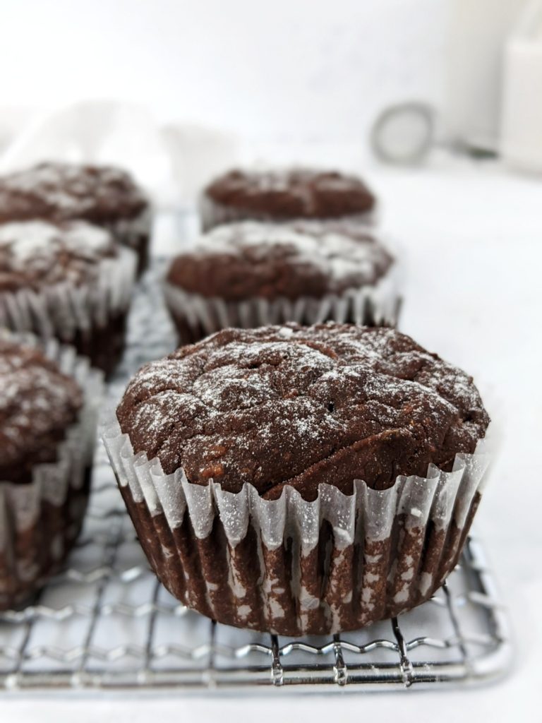 Easy and healthy Whole Wheat Chocolate Zucchini Muffins for a delicious and nutritious breakfast! Naturally sweetened with stevia, and made extra moist with Greek yogurt, these sugar free and low fat muffins are the perfect chocolatey treat.