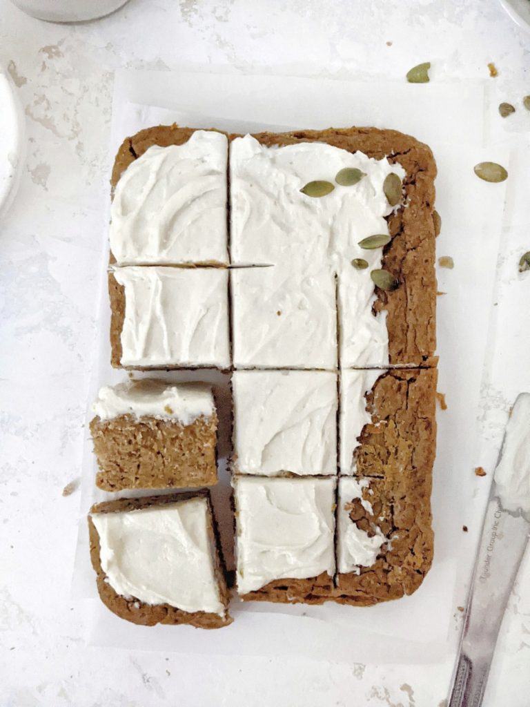 Healthy Oil-free Protein Pumpkin Cake made with whole wheat flour and protein powder, and topped with a protein cream cheese frosting. An easy and delicious snack cake perfect for a thanksgiving dessert or even post workout treat!