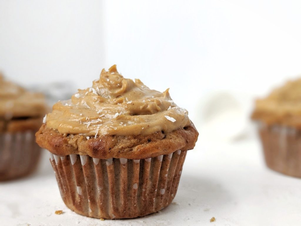 Easy and healthy Protein Apple Cupcakes topped with a Protein Peanut Butter frosting; Made with whole wheat flour, protein powder, greek yogurt and applesauce, these have no oil and are sugar free too! Pipe on some high protein peanut butter frosting and you have the perfect apple cupcake for breakfast or dessert!