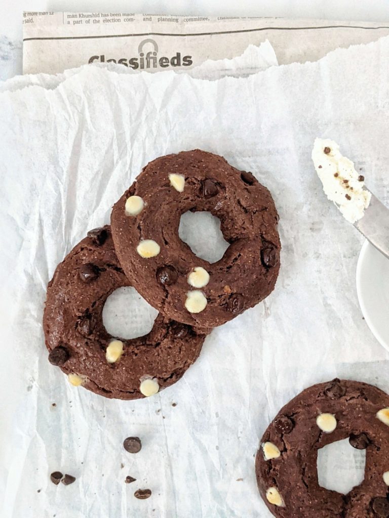 Healthy Whole Wheat Chocolate Bagels made with no yeast! Using whole wheat flour and greek yogurt, these 2 ingredient dough chocolate chocolate chip bagels are baked and perfect quick dessert-breakfast!