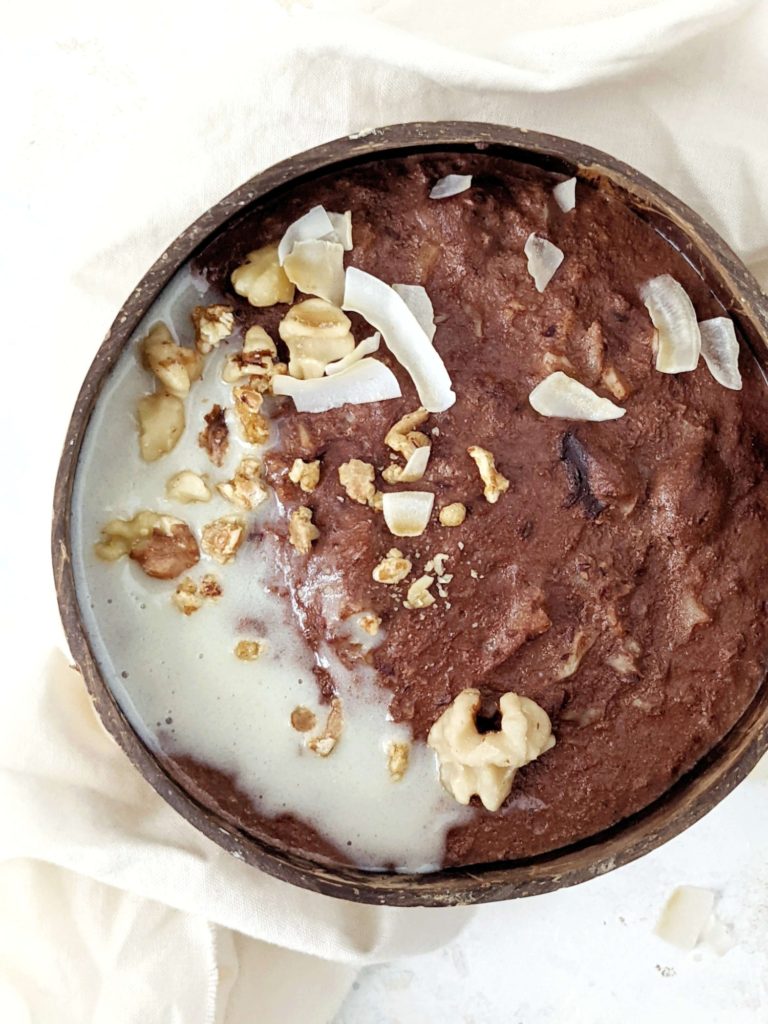 Creamy Chocolate Protein Cauliflower Oatmeal made with cauliflower rice and sweetened with chocolate protein powder for a healthy keto oatless oatmeal. A gluten free, low carb and keto protein oats recipe!