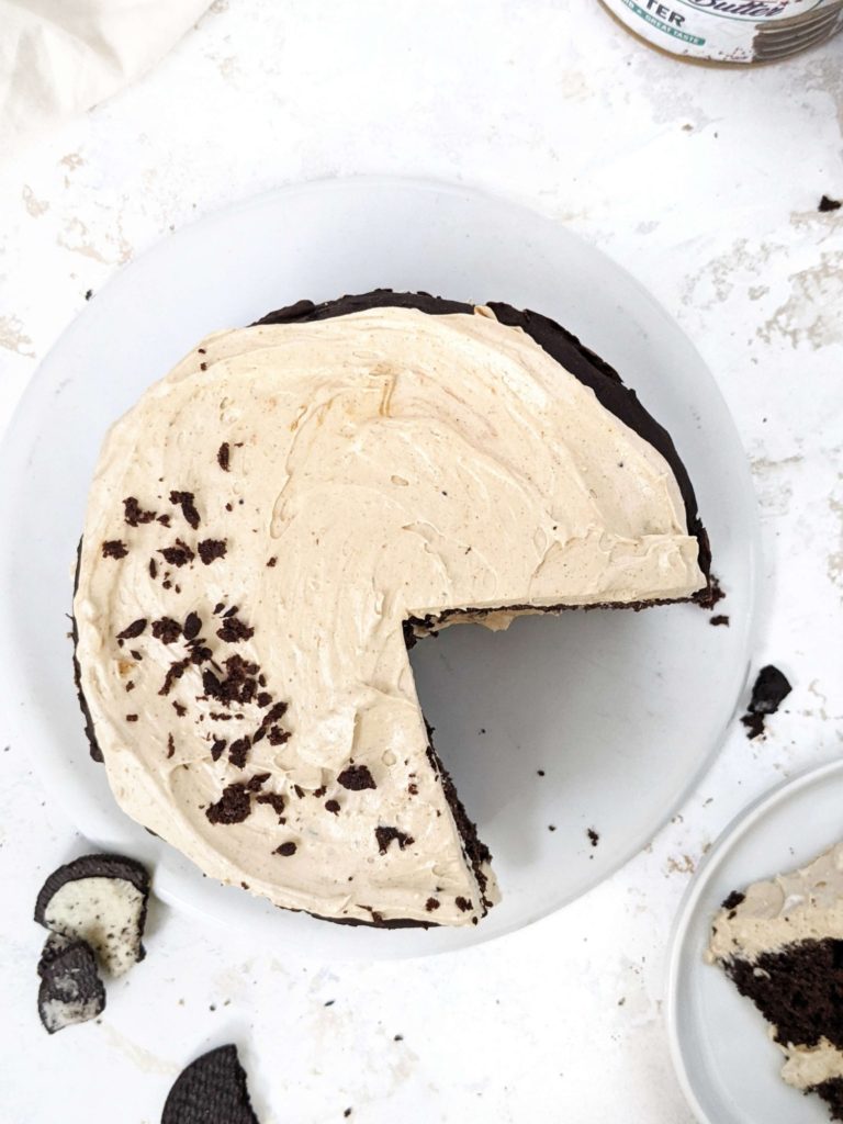 An irresistible Oreo Protein Cake topped with a Peanut Butter frosting for the cookies and cream flavor with a bonus. This simple protein cake uses chocolate protein powder, is sugar-free and has very little butter; Definitely better than other recipes out there!