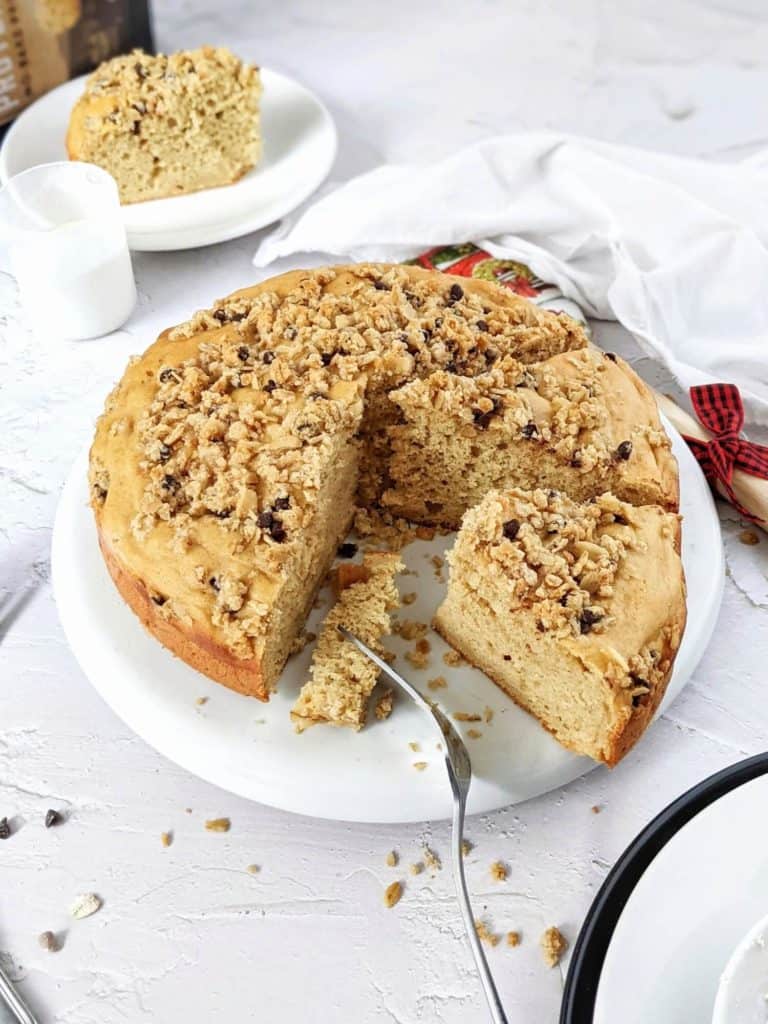 A super easy and simple Vanilla Protein Cake topped with an Oat Streusel - the perfect high protein cake recipe for a birthday or just a dessert. Made with whole wheat flour and vanilla protein powder, this protein cake is healthy and sugar-free too!