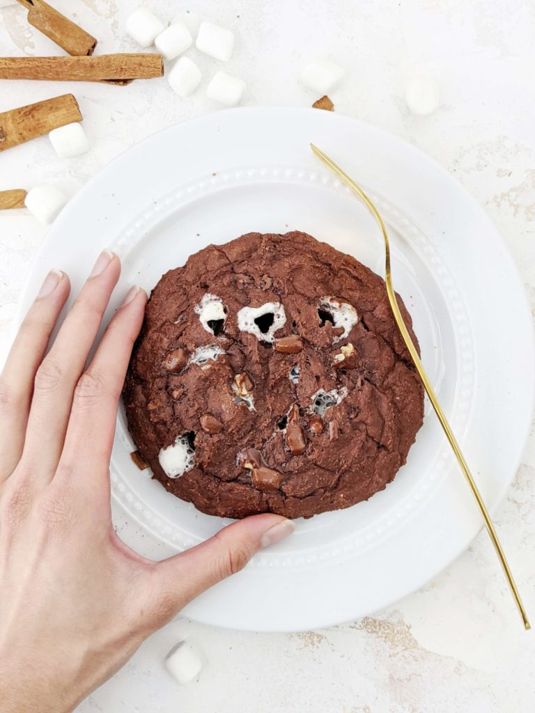 This Mexican Hot Chocolate Protein Cookie with marshmallows is just so good, but good for you! A healthy hot chocolate cookie with the spicy Mexican flavor and sweetened with protein powder; Vegan option too!