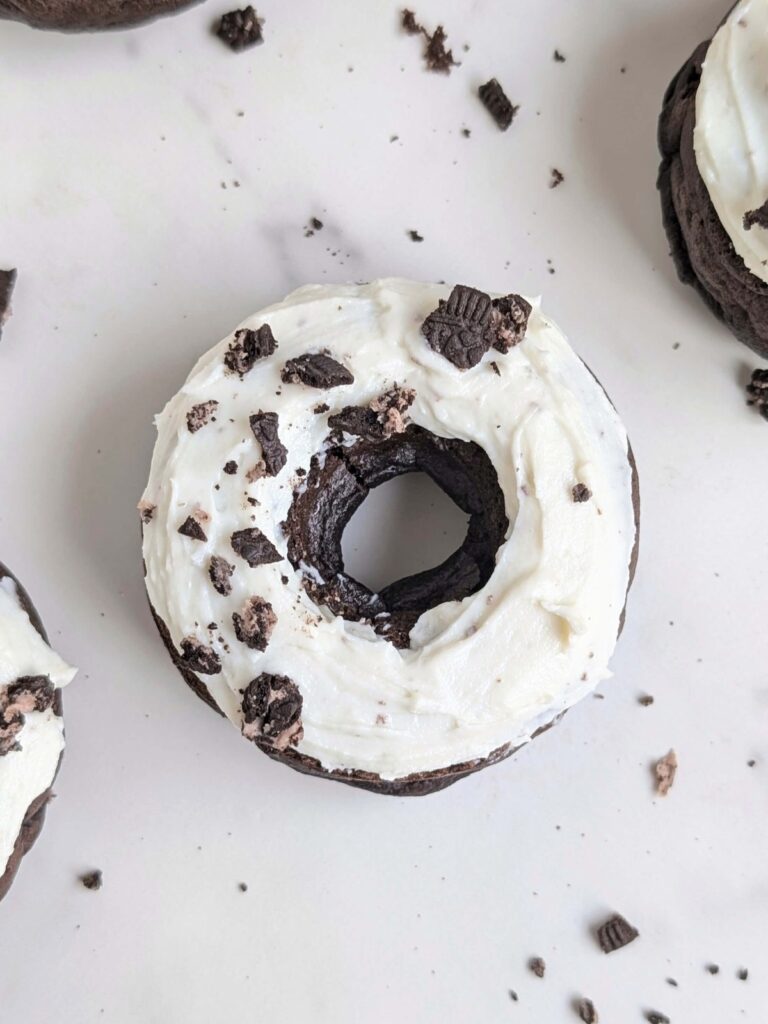 Extremely low calorie and no fat Oreo Protein Donuts with chocolate protein powder, a lot of egg whites, and no oil or butter! These glazed cookies and cream protein donuts have the spot on Oreo flavor and make the best anabolic donuts recipe!