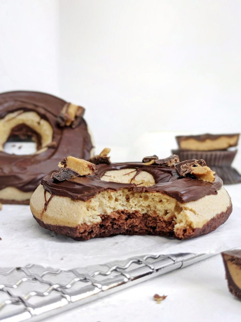 Spot-on Peanut Butter Cup Protein Donuts with chocolate and peanut butter protein donut layers glazed with chocolate. These Reese’s protein donuts are low fat, low calorie and sugar free too!