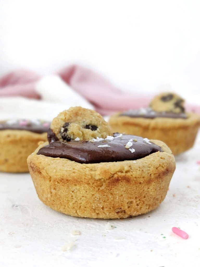 Just amazing Protein Cookie Cups with a protein chocolate filling - but still sugar free! Protein packed cookie dough cups are made with simple ingredients, are gluten free and easily Vegan too.