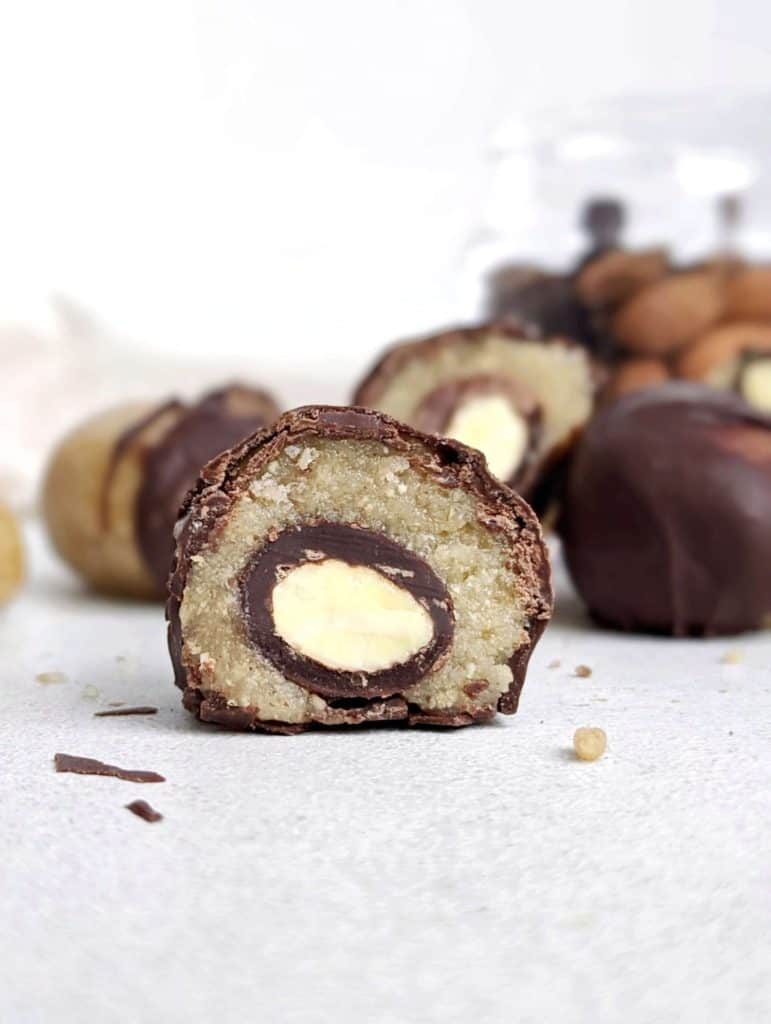 Perfect Chocolate Covered Almond Protein Balls made with the actual chocolate coated candy! These almond flour or ground almond protein balls are sweetened with protein powder and great for a snack with an energy boost!