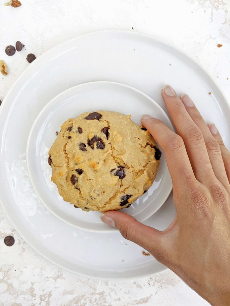 A big single serve Copycat Levain Bakery Protein Cookie made healthy with oat flour, protein powder and no sugar or butter. This homemade Levain inspired cookie recipe is gluten free, sugar free and Vegan too!