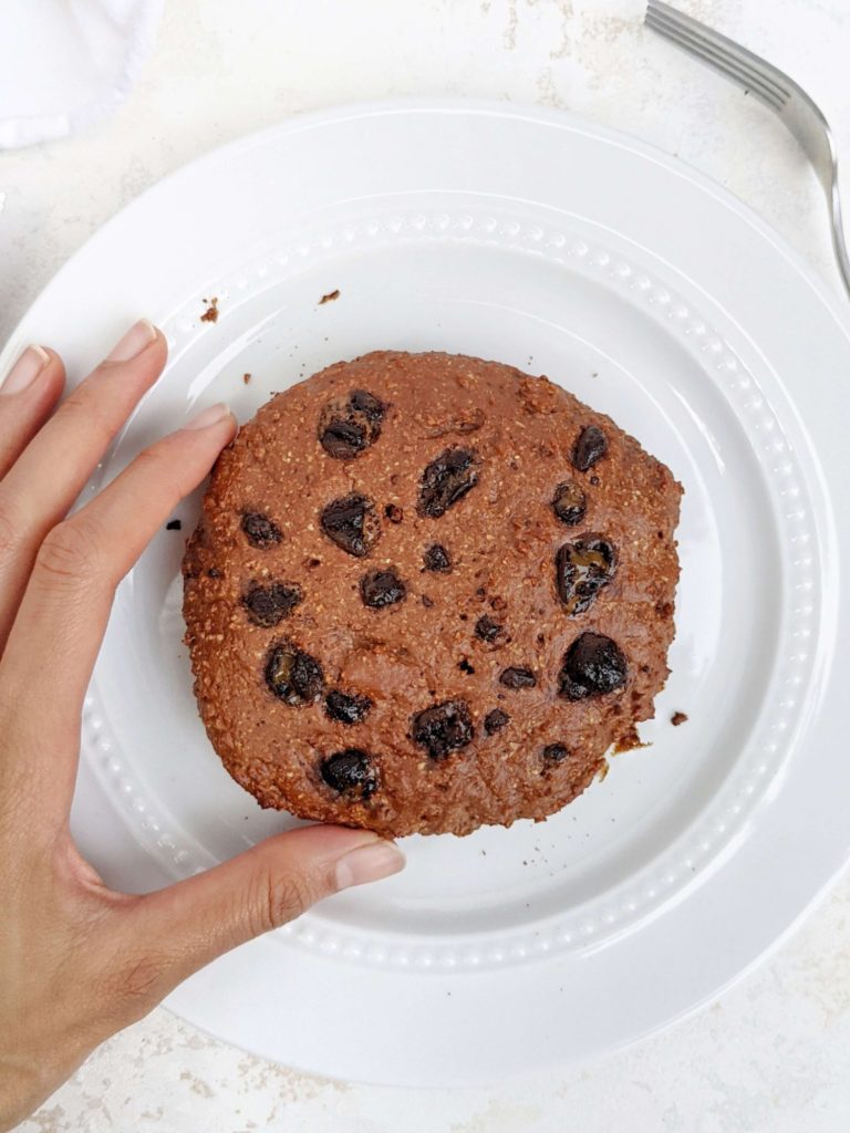 A supreme Triple Fudge Air Fryer Chocolate Protein Cookie with a gooey molten chocolate center! Made with triple fudge chocolate protein powder this air fryer protein cookie is rich and indulgent, but still gluten free, sugar free and Vegan!