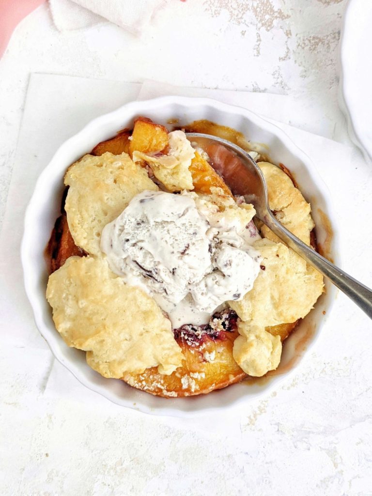 A beautiful High Protein Peach Cobbler for One to satisfy the cravings. This single serving healthy peach cobbler uses protein powder in the filling and cobbler and has no sugar at all!