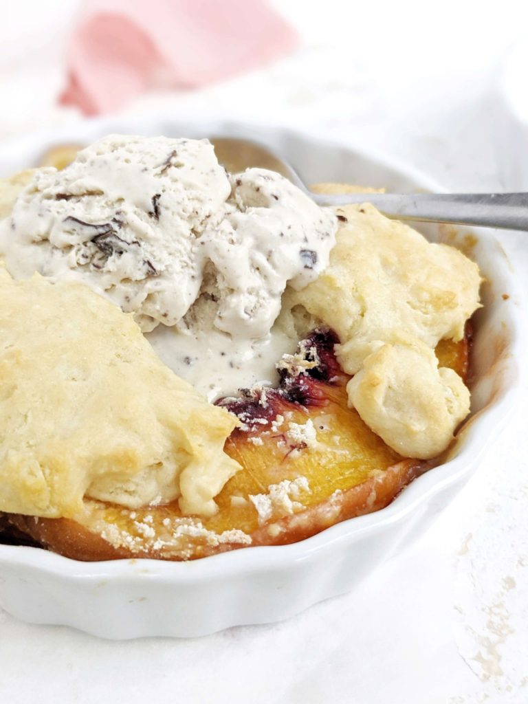 A beautiful High Protein Peach Cobbler for One to satisfy the cravings. This single serving healthy peach cobbler uses protein powder in the filling and cobbler and has no sugar at all!