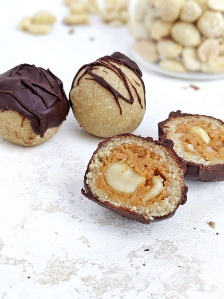 The perfect Snickers Protein Balls with all the candy layers - nougat, caramel, peanuts and chocolate - but healthy and easy too! These no bake Snickers protein bites are sweetened with protein powder so sugar free, and actually low fat, gluten free and Vegan too!