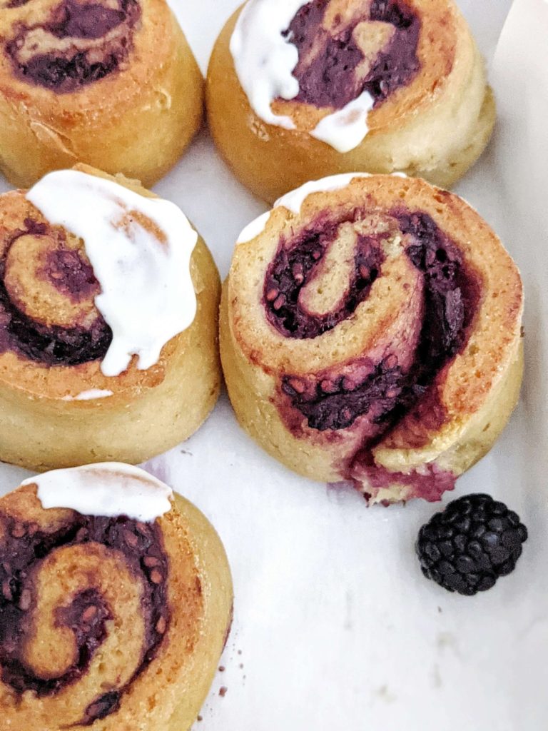 Soft and gooey Berry Protein Sweet Rolls with a homemade sugar-free berry jam and protein icing. Make protein powder sweet rolls with blackberry, strawberry, blueberry or a mix of all for healthy breakfast swirls.