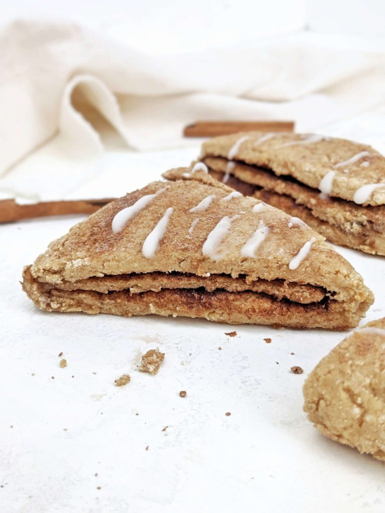 Just amazing Cinnamon Protein Scones made with protein powder, Greek yogurt and filled with layers of sugar-free cinnamon sugar. Protein packed healthy cinnamon scones have no cinnamon chips either, and really are a clean breakfast delight.