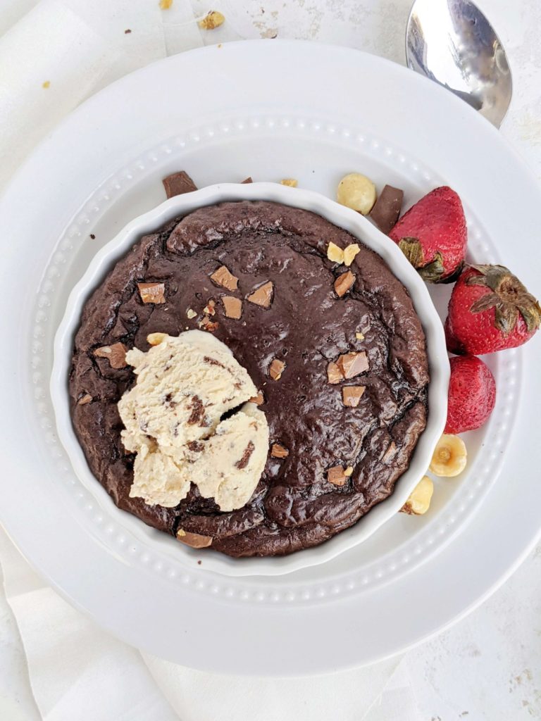 A super rich Half Baked Protein Fudge Brownie with perfect fudgy sides and gooey center! This single serving chocolate fudge protein brownie in a mug uses a ton of protein powder, has no sugar or oil, and is flourless too!