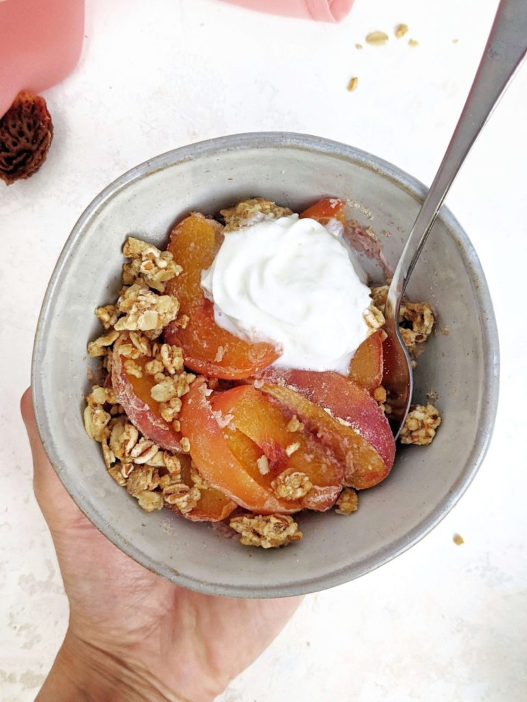 A quick, hacky and healthy Single Serve Peach Crisp made in the microwave and topped with granola! This high protein peach crisp for one uses protein powder and is truly a great healthy and sugar free individual mini dessert!