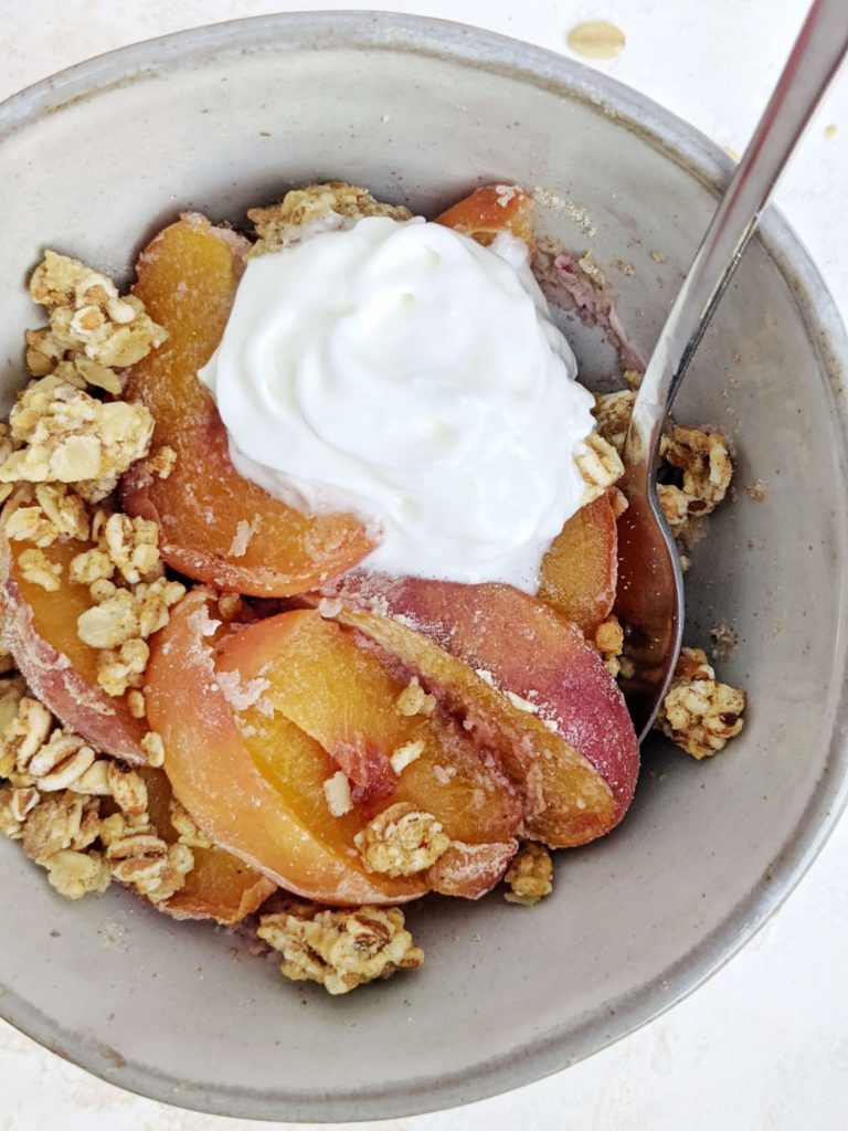 A quick, hacky and healthy Single Serve Peach Crisp made in the microwave and topped with granola! This high protein peach crisp for one uses protein powder and is truly a great healthy and sugar free individual mini dessert!