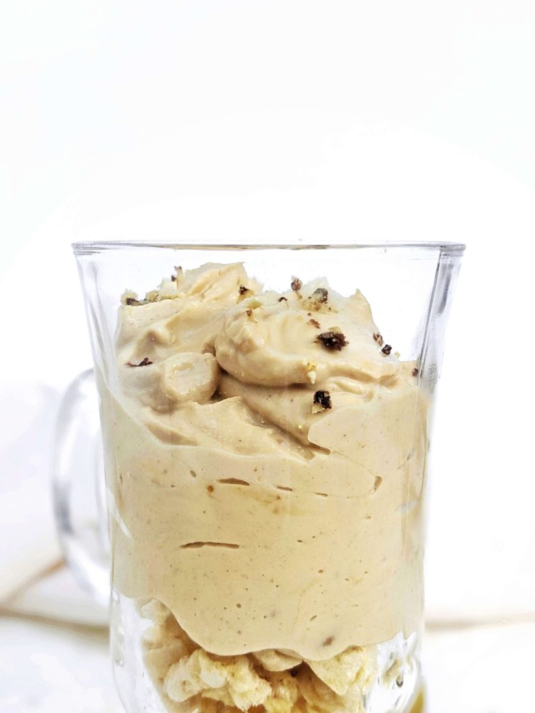 A quick, easy and creamy Peanut Butter Protein Mousse with protein powder, Greek yogurt and powdered peanut butter. Healthy powdered peanut butter mousse has no heavy cream or cream cheese, and is low calorie, low carb, keto and easily Vegan too!