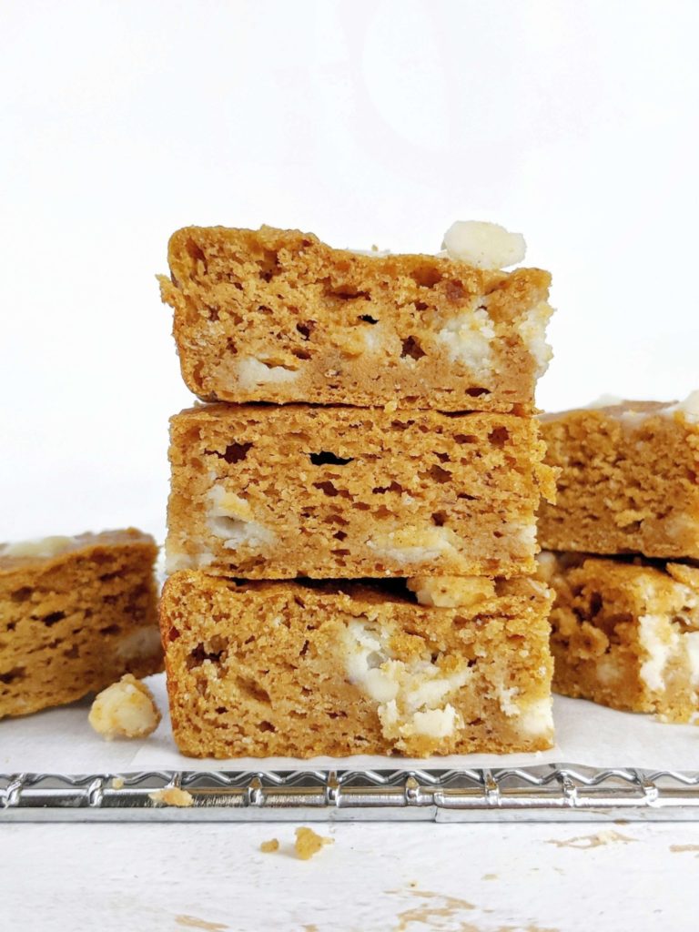 White Chocolate Pumpkin Protein Blondies loaded with pumpkin spice - a fall-perfect pumpkin dessert! These healthy pumpkin protein powder blondies are gluten free, Vegan and low calorie too!