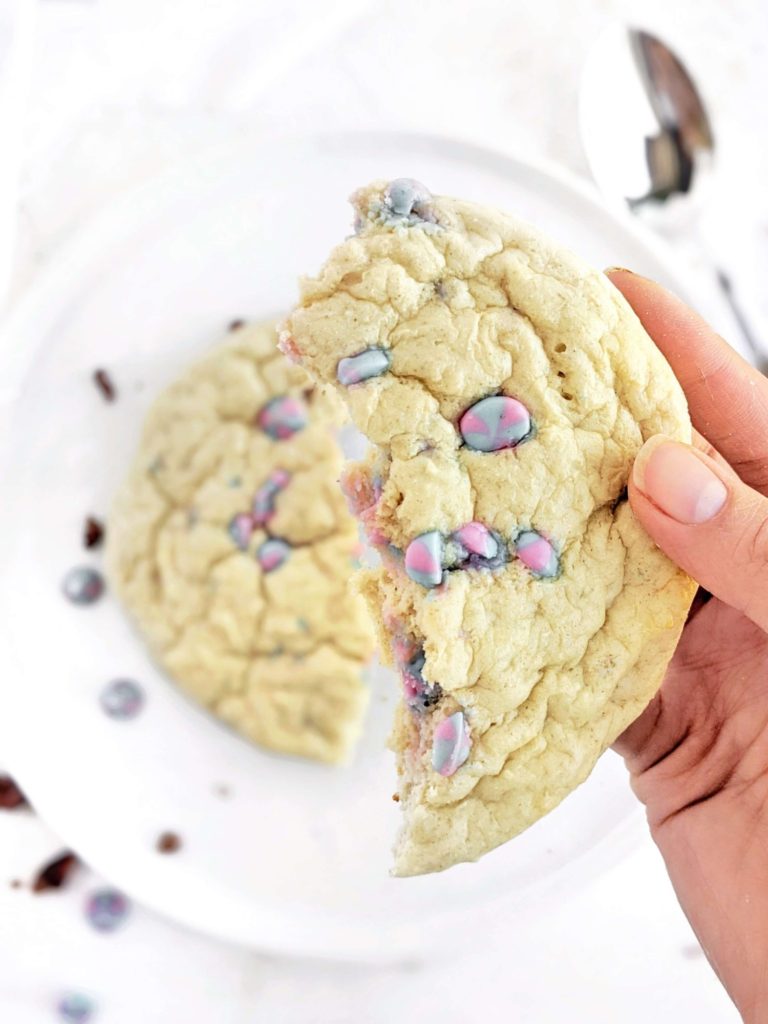 A loaded, low calorie Protein Sugar Cookie recipe filled with white chocolate chips! This protein powder sugar cookie is soft, sweet and actually healthy with applesauce and yogurt, but no butter or sugar!