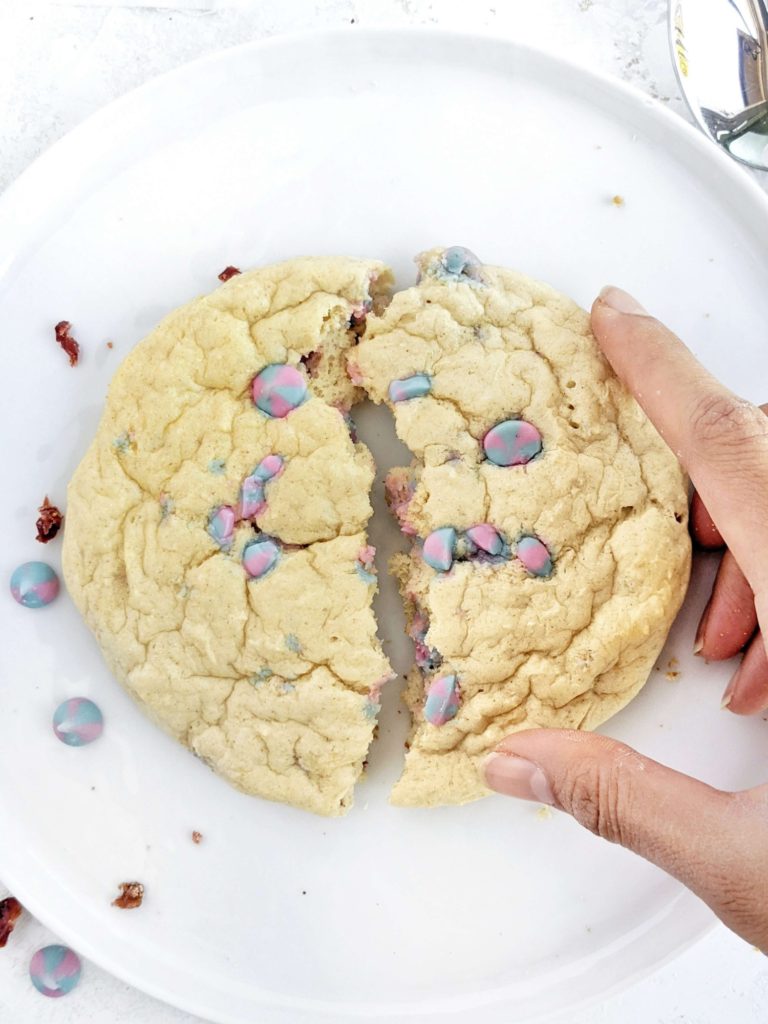 A loaded, low calorie Protein Sugar Cookie recipe filled with white chocolate chips! This protein powder sugar cookie is soft, sweet and actually healthy with applesauce and yogurt, but no butter or sugar!