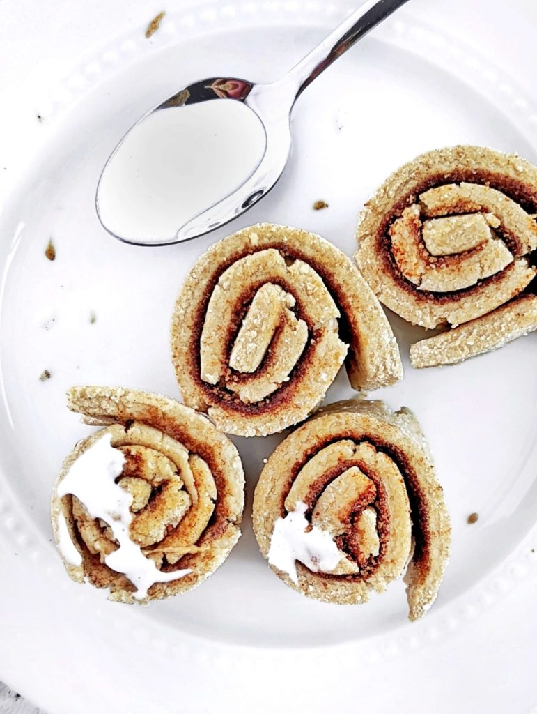 Spot on No Bake Protein Cinnamon Rolls with the soft and gooey texture, but no oven and no yeast needed. These raw no bake cinnamon rolls use protein powder, monkfruit sweetener and healthy cinnamon almond butter for the perfect snack or post workout treat.