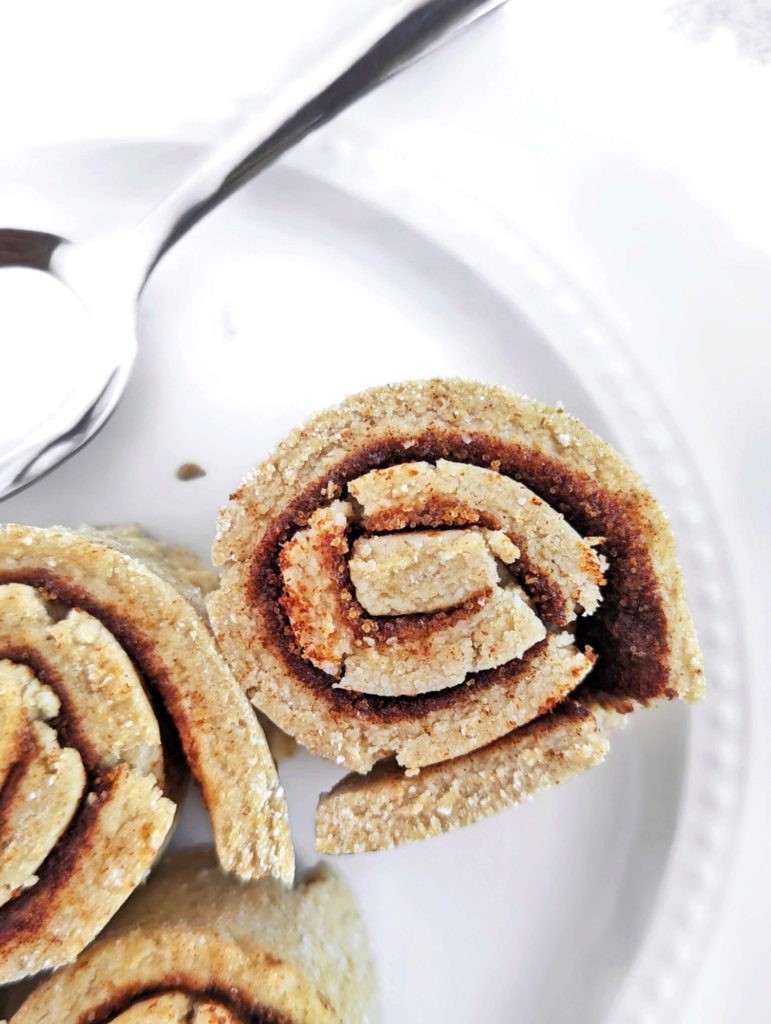 Spot on No Bake Protein Cinnamon Rolls with the soft and gooey texture, but no oven and no yeast needed. These raw no bake cinnamon rolls use protein powder, monkfruit sweetener and healthy cinnamon almond butter for the perfect snack or post workout treat.