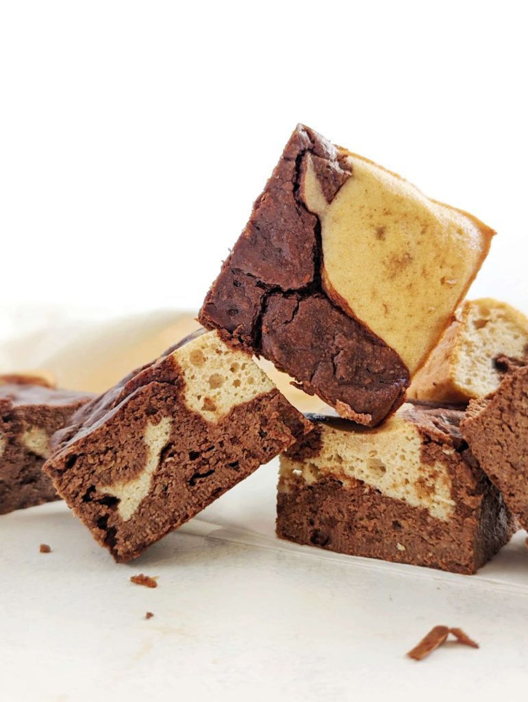 Beautiful Pancake Mix Protein Brownies with layered protein brownie and pancake, both using pancake mix, not four. These healthy pancake brownie recipe uses Kodiak protein pancake mix, cocoa powder and protein powder.