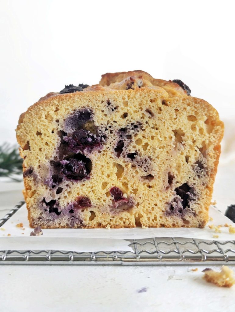 Fresh and festive Protein Blueberry Eggnog Bread for breakfast, post workout or dessert. This healthy eggnog bread uses fresh blueberries, protein powder and almond milk nog, and has no oil or sugar added!