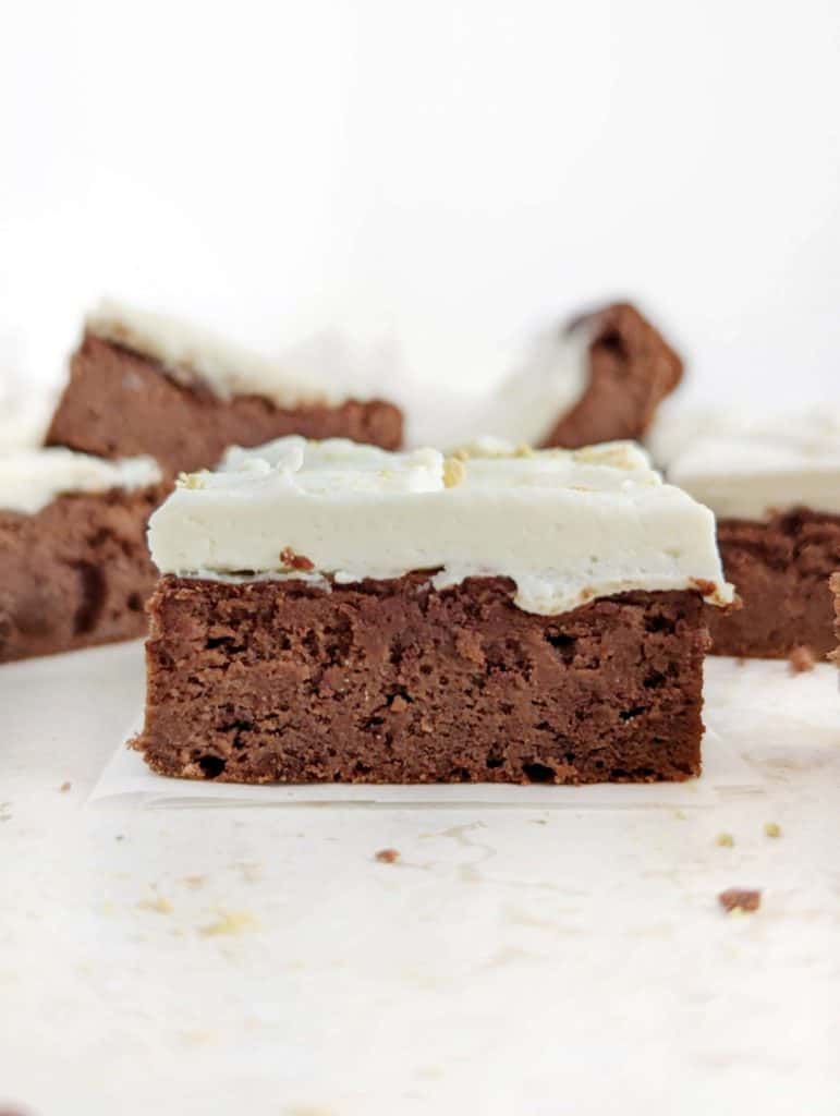 Delicious Gingerbread Protein Brownies with a Cream Cheese Frosting! These gingerbread brownies have no molasses, but use protein powder and monk fruit sweetener for a healthy festive dessert.