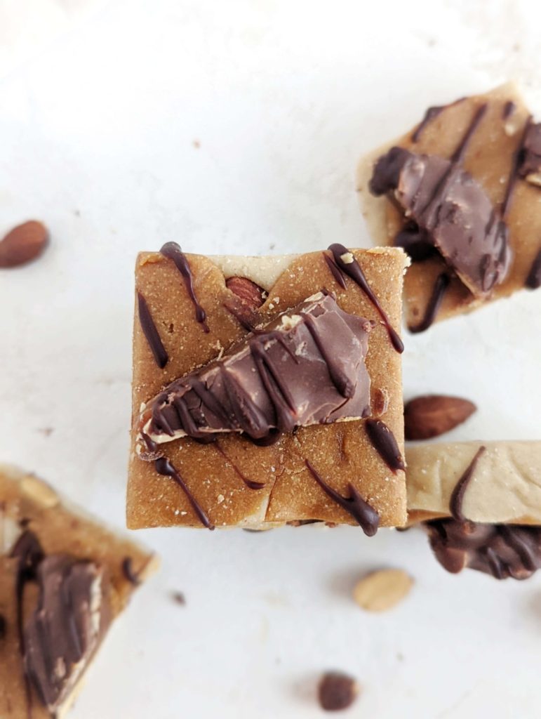 Easy homemade Caramel Almond Protein Bars with flavor and texture but no sugar! These healthy caramel protein bars use protein powder, oat flour and peanut butter powder, for a sugar free and gluten free snack.