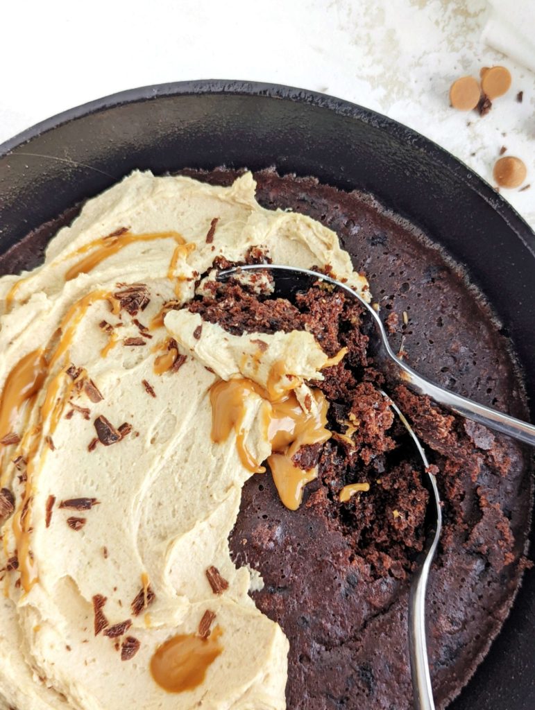 Amazing Chocolate Protein Skillet Cake with a protein peanut butter frosting! This healthy and low calorie chocolate skillet cake uses protein powder and has no sugar, oil or eggs!