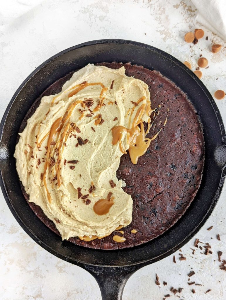 Amazing Chocolate Protein Skillet Cake with a protein peanut butter frosting! This healthy and low calorie chocolate skillet cake uses protein powder and has no sugar, oil or eggs!