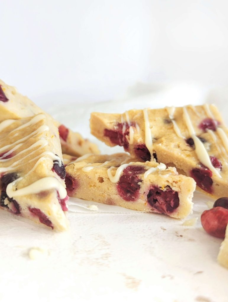 Refreshing Cranberry Orange Protein Bars with fresh cranberries for a healthy snack or post-workout treat! These cranberry energy bars use protein powder and monkfruit and have no added sugars.