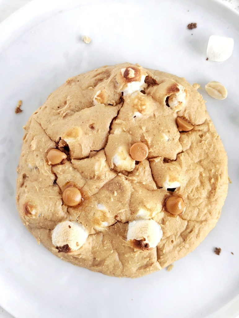 An amazing Fluffernutter Protein Cookie for one made with marshmallow and peanut butter powder for a healthy recipe. This peanut butter marshmallow protein cookie is gluten free, has no butter and vegan option too.