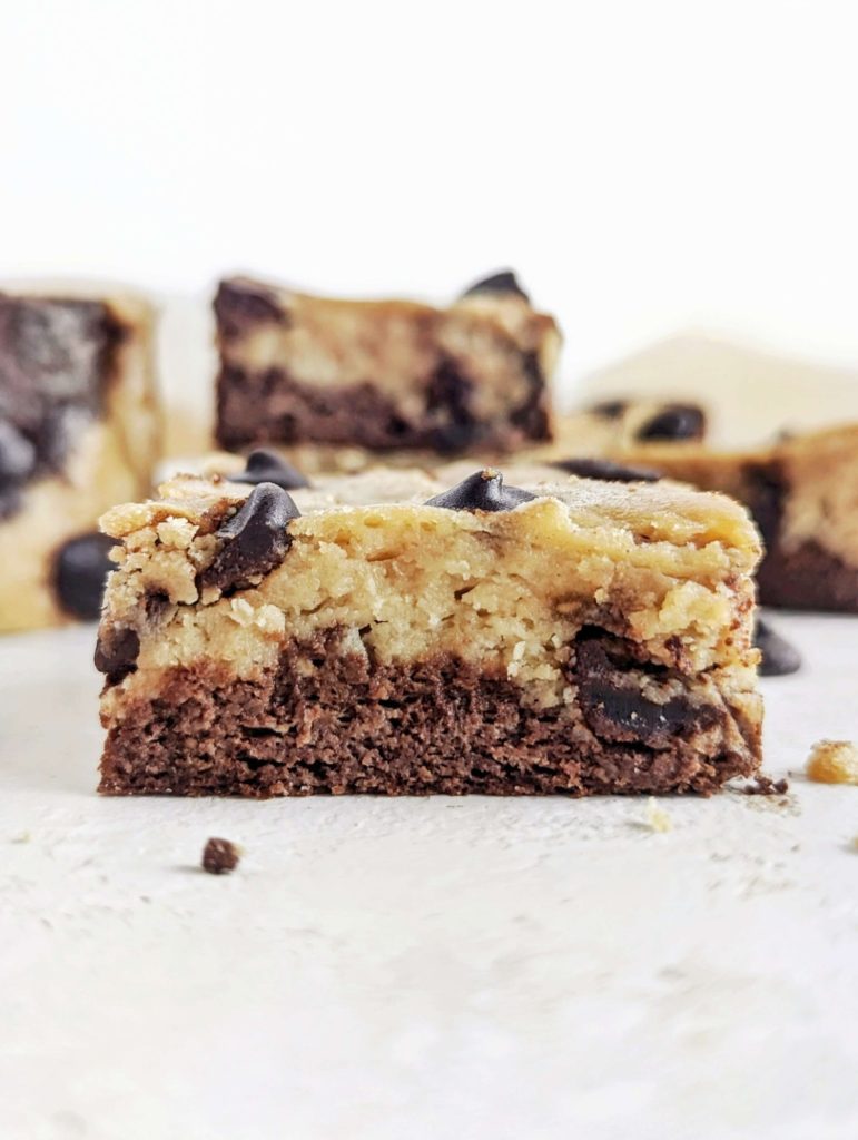 The best healthy and sugar free Protein Brookies here – a protein brownie and protein cookie mashup! These healthy brookie bars are sweetened with monkfruit sweetener and protein powder, and have no oil or butter either!