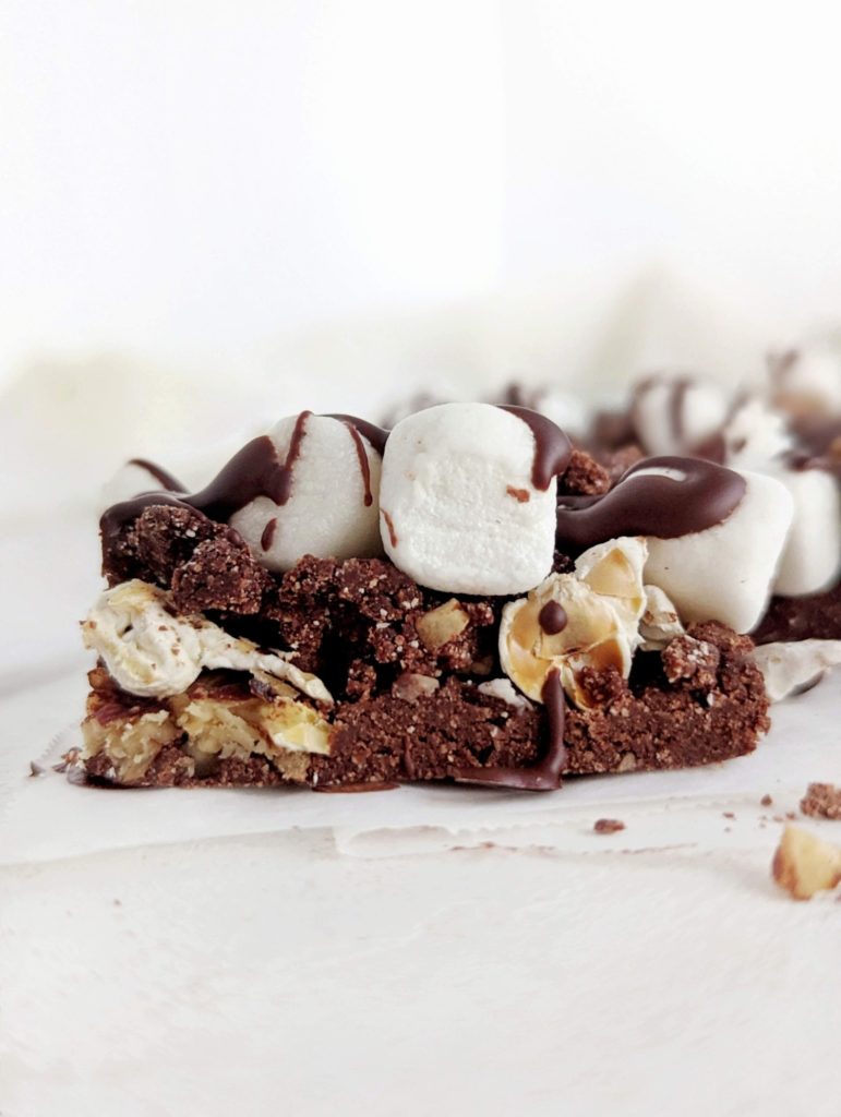 Funky and healthy Rocky Road Protein Bars with popcorn and pecans. No bake rocky road bars use protein powder and cocoa powder, and have no melted chocolate or peanut butter!