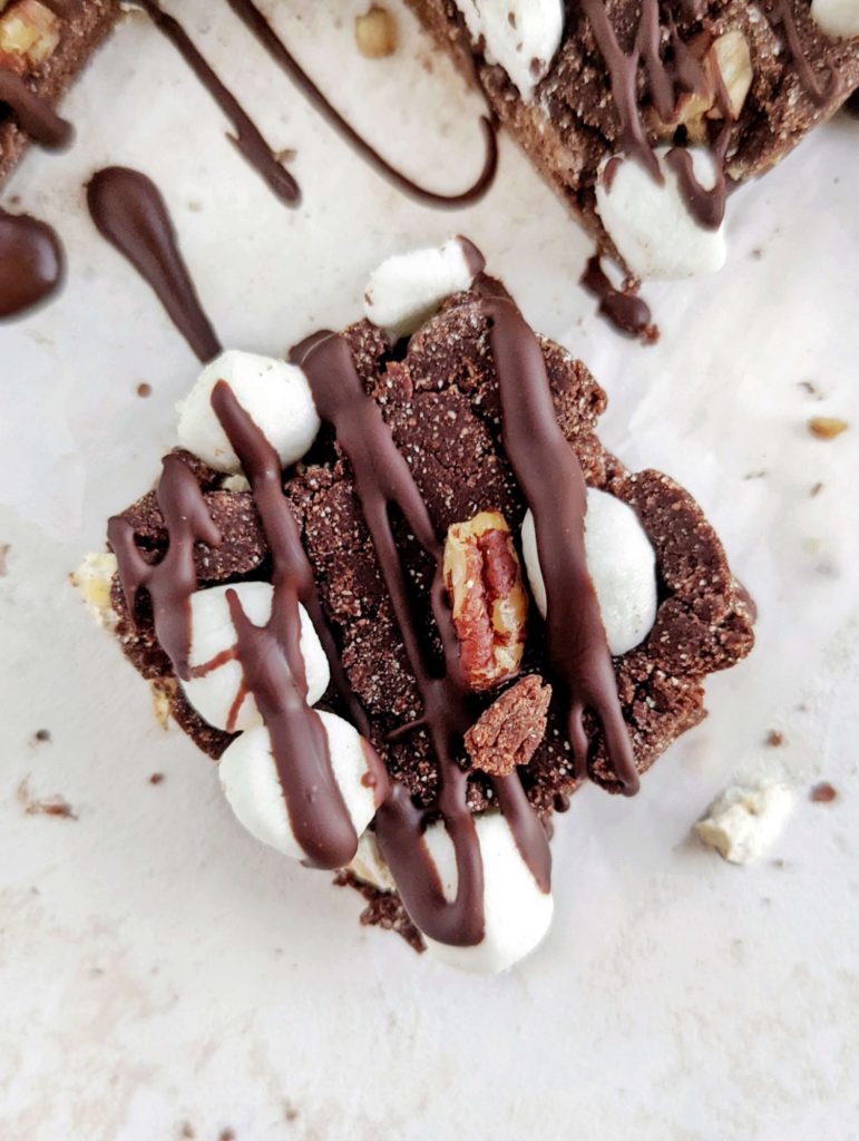 Funky and healthy Rocky Road Protein Bars with popcorn and pecans. No bake rocky road bars use protein powder and cocoa powder, and have no melted chocolate or peanut butter!