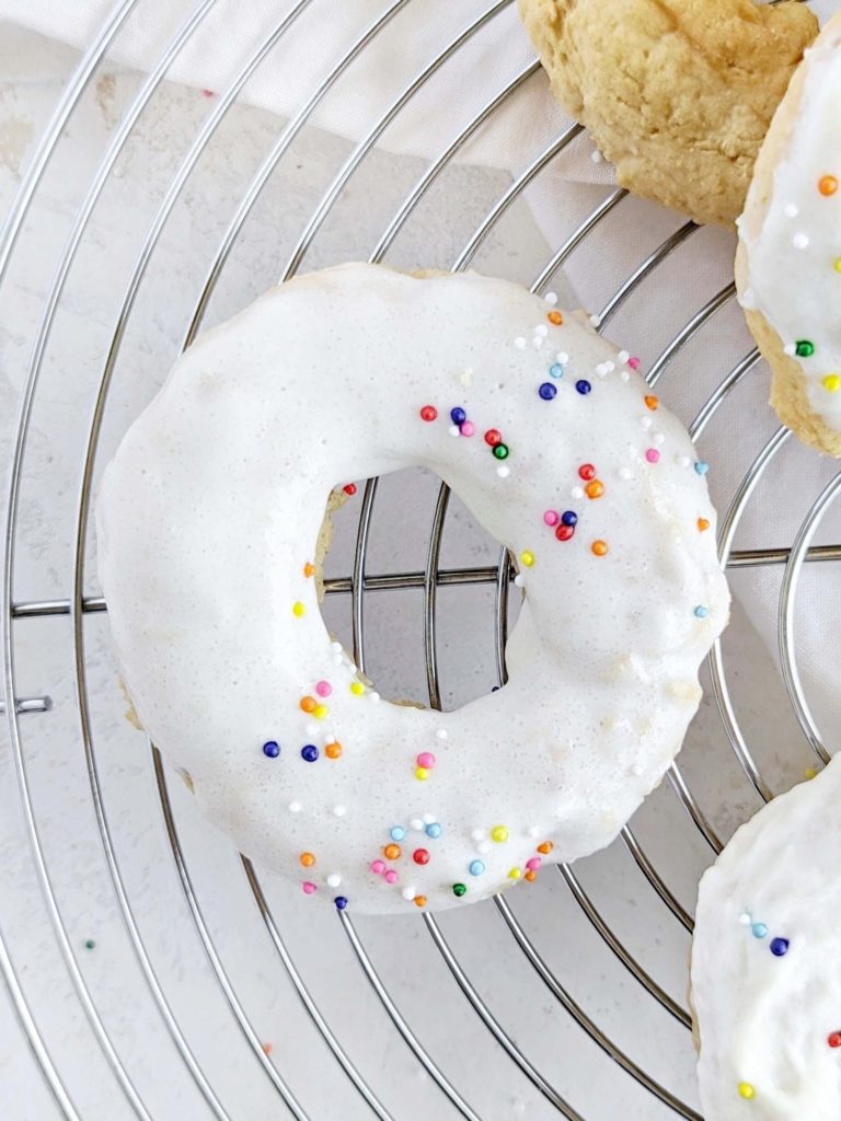 Actually light and fluffy Air Fryer Protein Donuts in under 15 minutes with no donut pan needed! Healthy air fryer donuts recipe uses protein powder and is sugar free too.