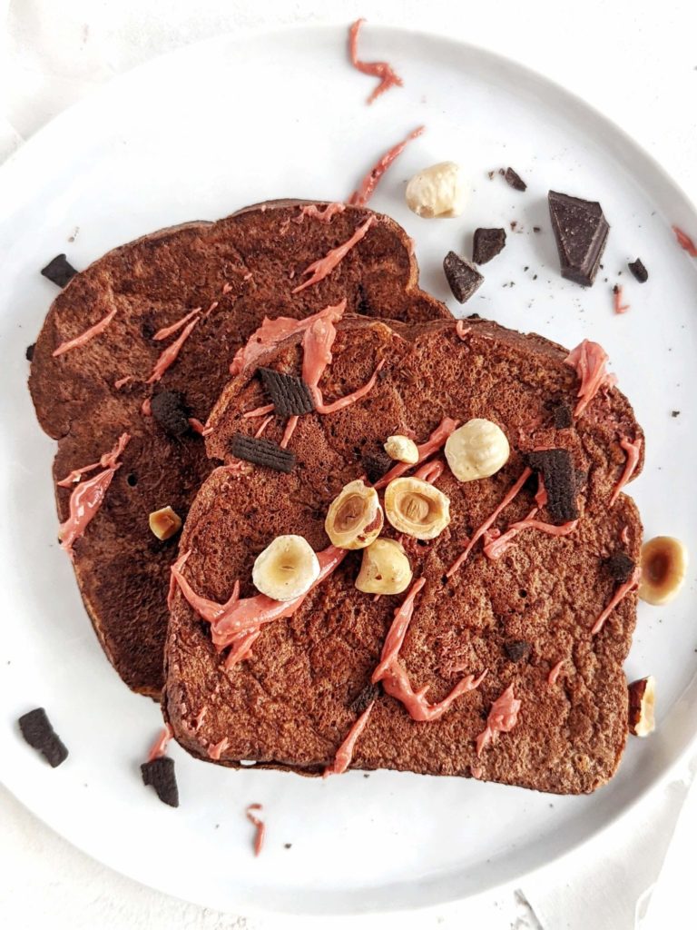 Make this Chocolate Protein French Toast for a rich and indulgent breakfast or brunch with a boost of protein. Made with whole wheat bread, chocolate protein powder and an egg white, this healthy French toast is a great high protein and low fat alternative.