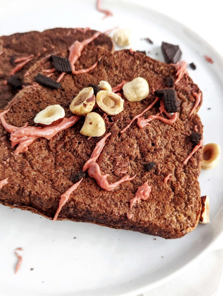 Make this Chocolate Protein French Toast for a rich and indulgent breakfast or brunch with a boost of protein. Made with whole wheat bread, chocolate protein powder and an egg white, this healthy French toast is a great high protein and low fat alternative.