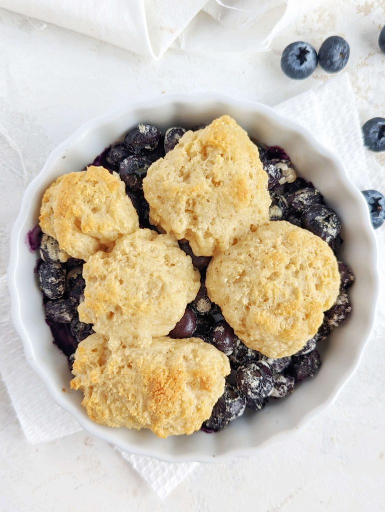 Small and easy Protein Blueberry Cobbler with big flavor; This single serve protein powder blueberry cobbler has no sugar, is low fat and a perfect healthy dessert for one!