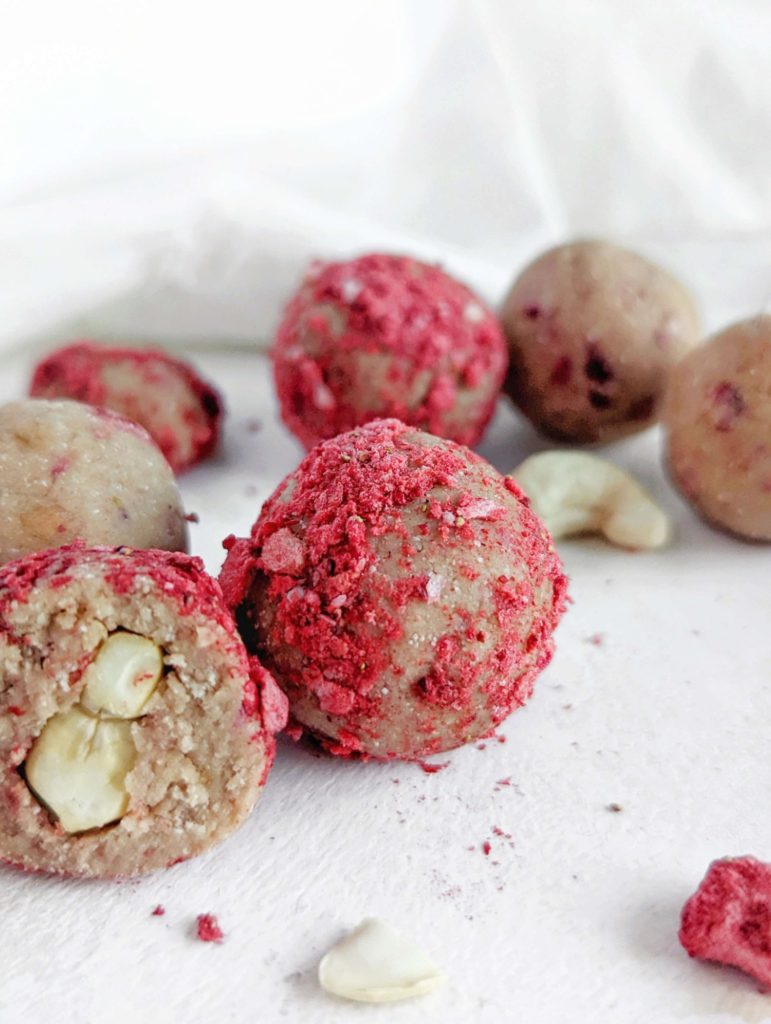 Pretty and perfect Strawberry Protein Balls with the crunch of a cashew inside! Strawberry protein bites are healthy, low carb, low fat, gluten free and have no sugar added!