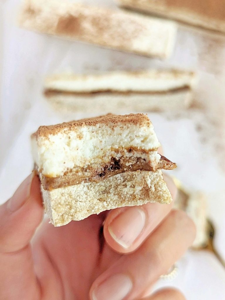 Just amazing Tiramisu Protein Bars with a protein base, coffee caramel and cream layer! These easy, healthy tiramisu bars are sugar free, gluten free and low fat too!