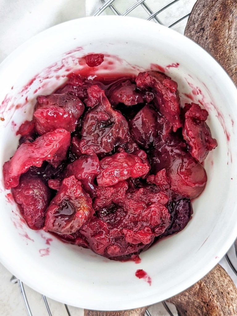 Just amazing Black Forest Protein Donuts with a rich chocolate protein cake donut, protein frosting and cherry topping! These black forest donuts are healthy, low fat and sugar-free too.