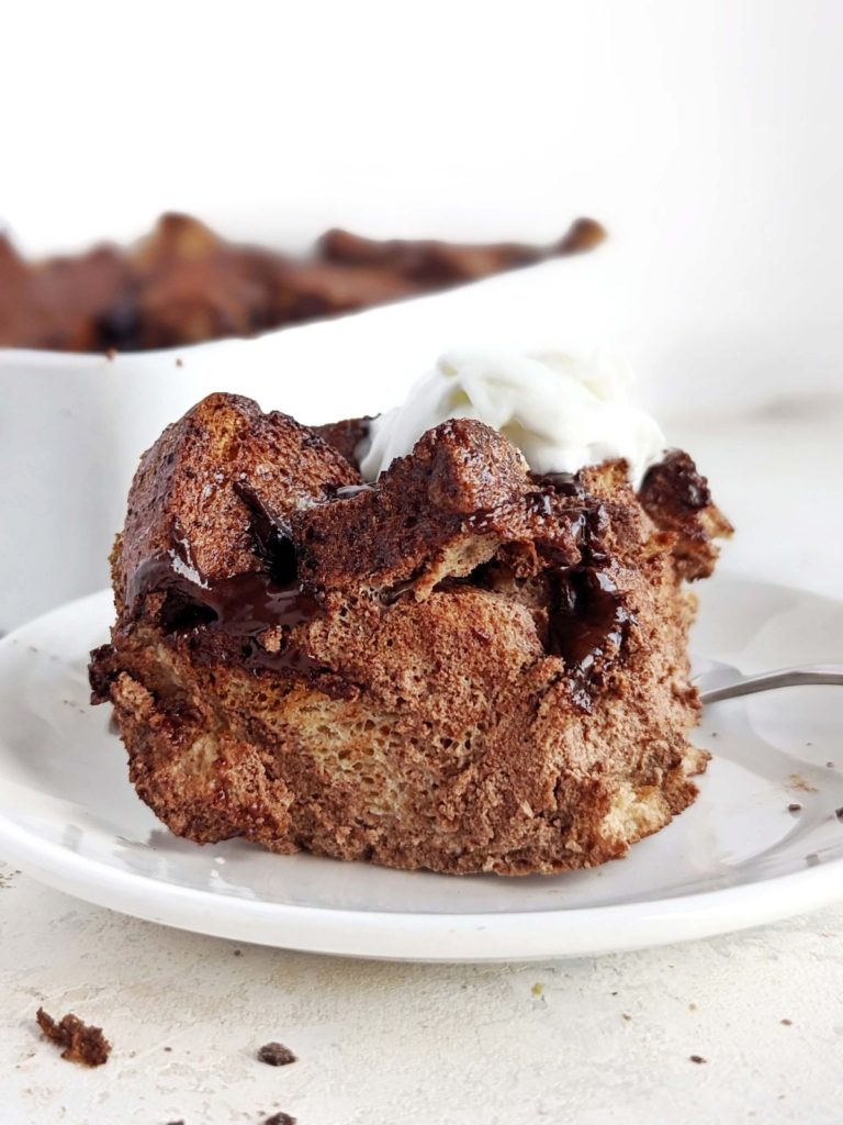 A rich, indulgent and skinny Chocolate Protein Bread Pudding you definitely need to try! Healthy, low calorie chocolate bread pudding uses protein powder, has no egg and no cream; Perfect for a breakfast, dessert or post workout!