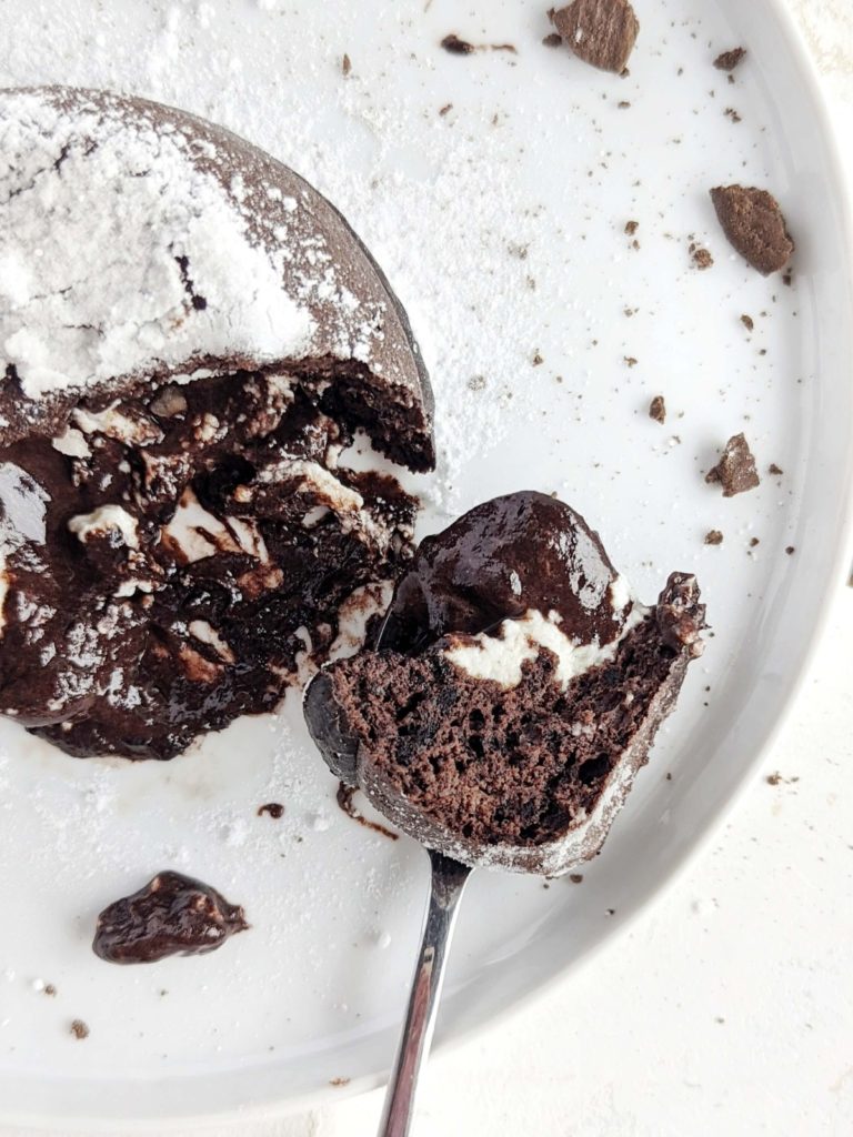 Delicious Protein Oreo Lava Cake for an easy and healthy dessert or one. This molten Oreo lava mug cake uses protein powder and is gluten free and sugar free too!